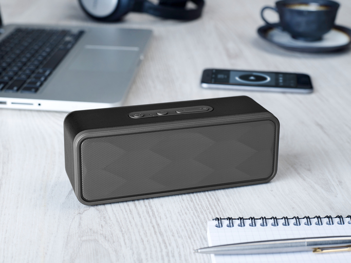 Wireless speaker on a table
